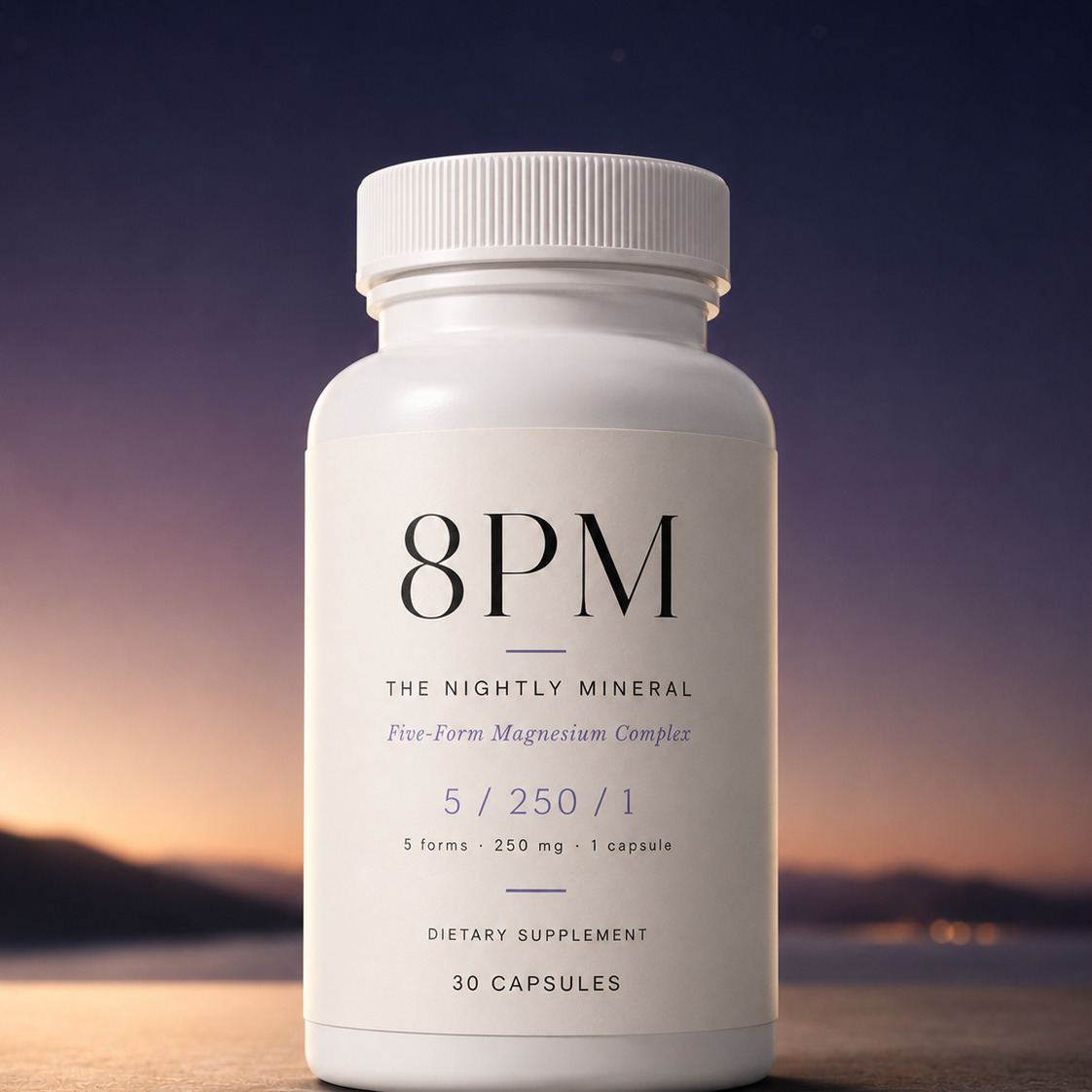 8PM The Nightly Mineral bottle on a stone ledge at dusk